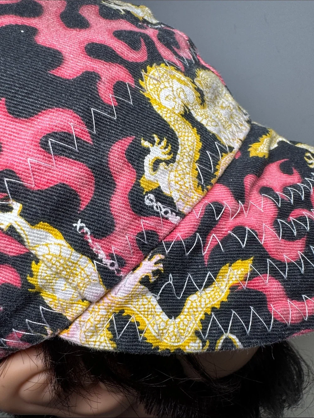 Comeaux reversible Pink & Black Dragon Print and red comfort soft Cap